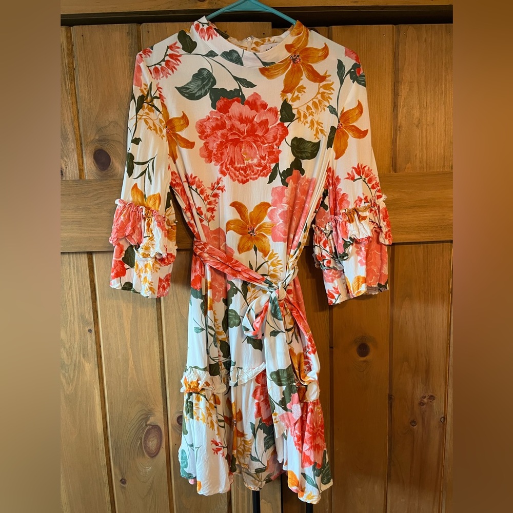 Floral mini dress. Size medium from Pedal & Pup